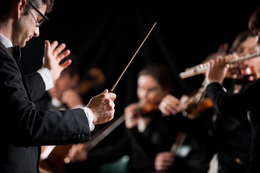 Schermerhorn Symphony Center, photo of a conductor leading an orchestra